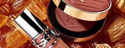 YSL-Schimmerrouge und Gloss auf bernsteinfarbenen Bonbons