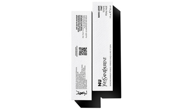 Alt text: A white packaging box for a Yves Saint Laurent product, featuring branding and product details in a sleek design.