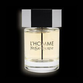 A stylish perfume bottle with a rectangular black cap and a clear glass base, labeled "L'Homme" by Yves Saint Laurent. The background is dark, highlighting the bottle's elegant design.