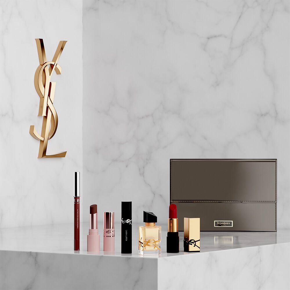 YSL Beauty-Set mit Miniprodukten und Kosmetiktasche.
