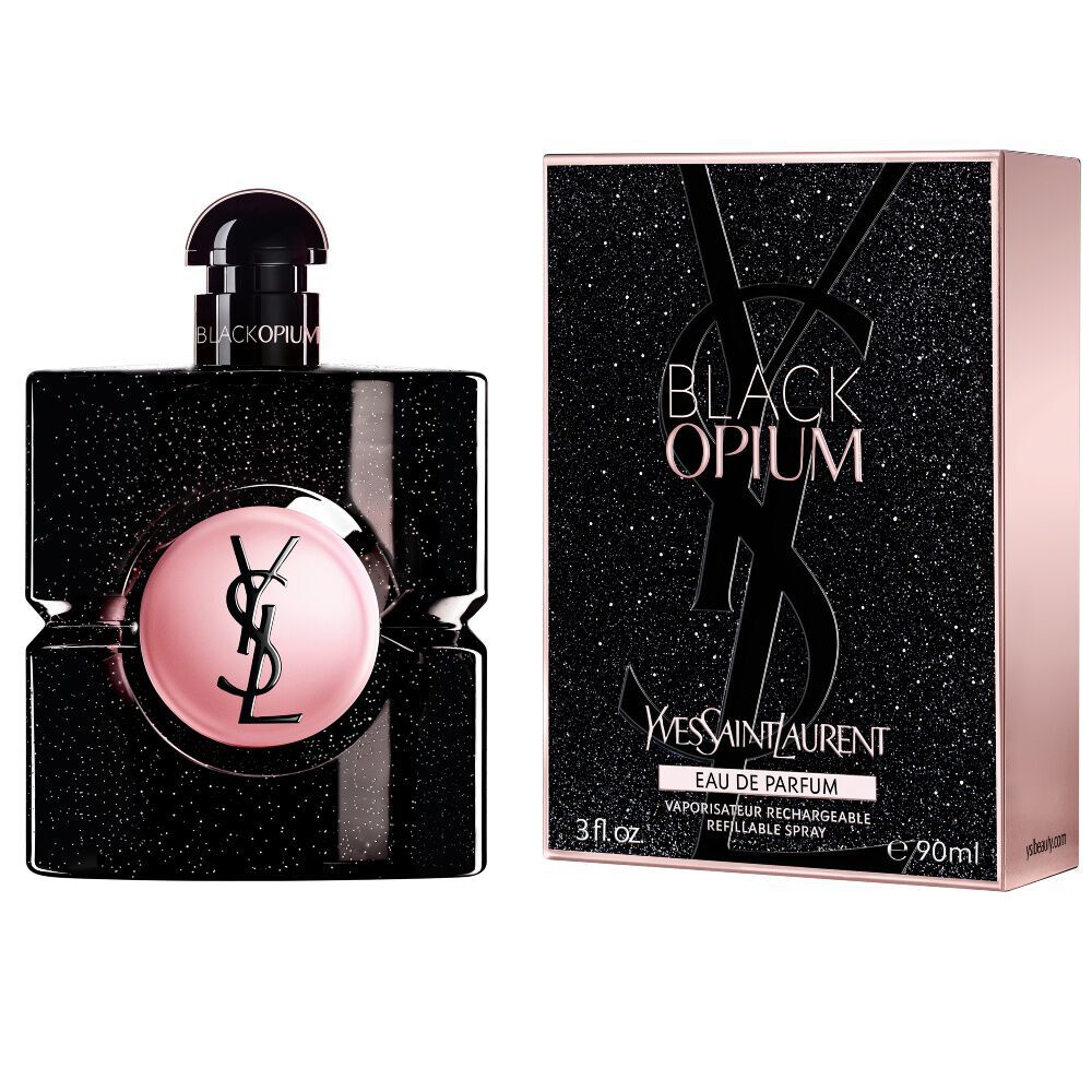 Black Opium Eau de Parfum Flakon neben seiner passenden schwarz glitzernden Box mit der YSL Cassandre.