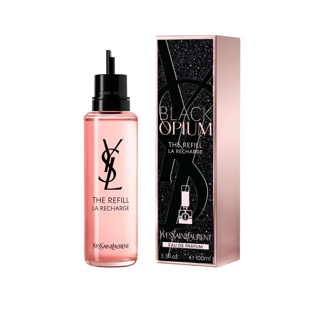 Black Opium Eau de Parfum Nachfullflakon neben seiner passenden schwarz glitzernden Box mit der YSL Cassandre.